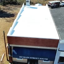 Doctor's office roof after white coating