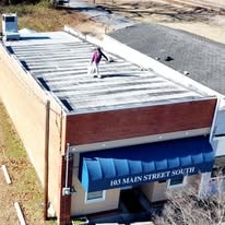 Doctor's office roof before coating — 103 Main Street South