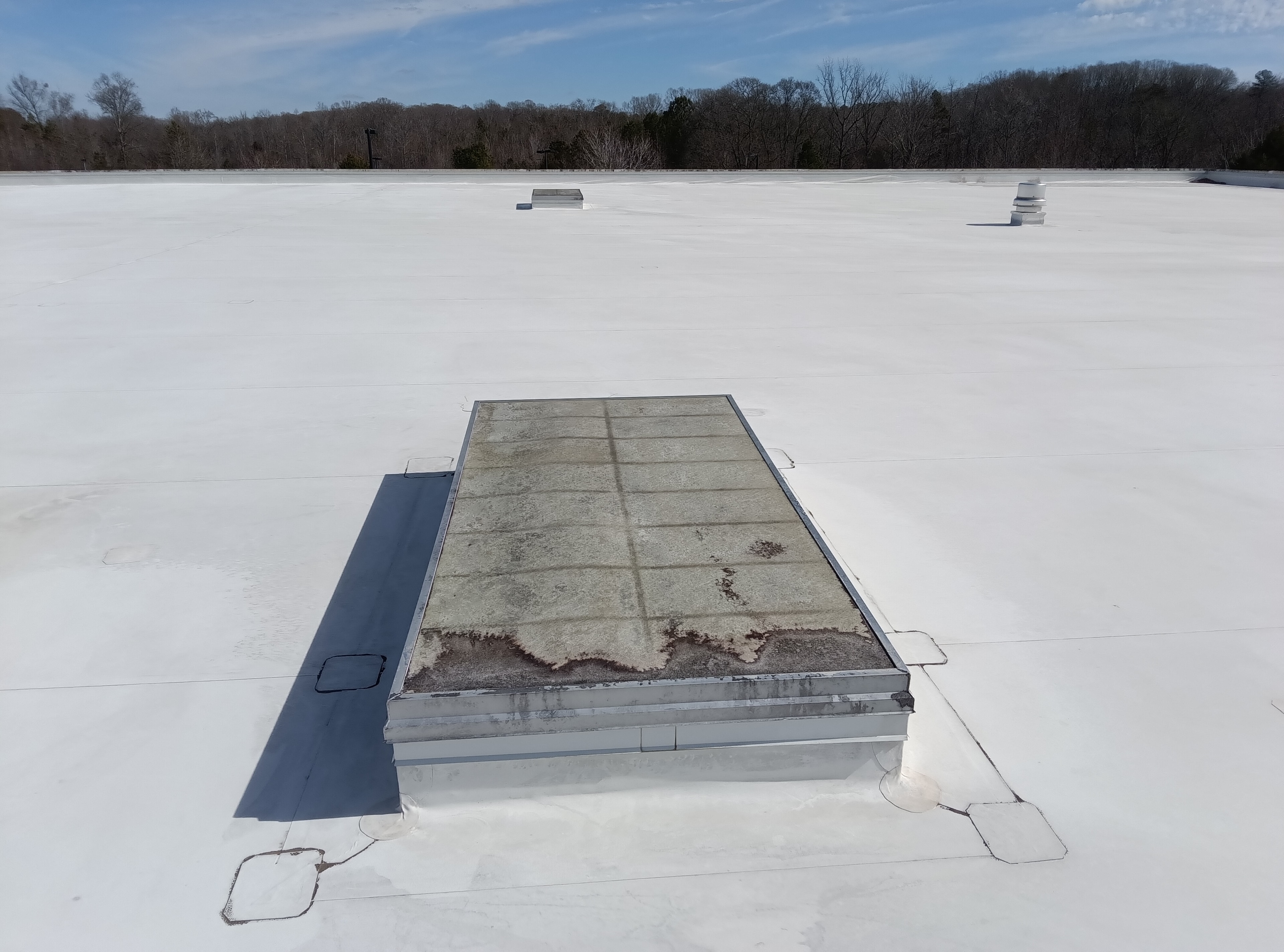 Fort Mill commercial roof before coating — HVAC unit and roof surface