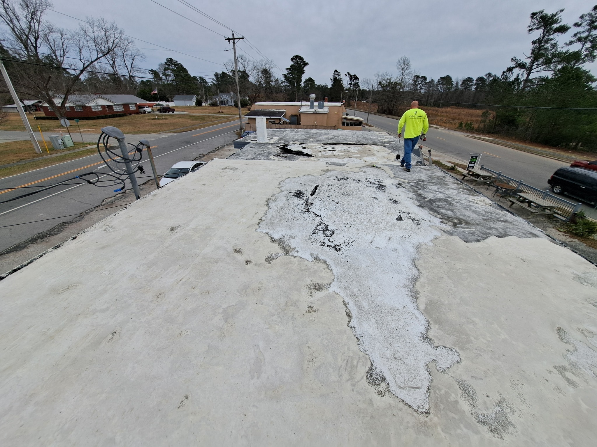 Little River Cafe finished roof — aerial view showing full coating coverage