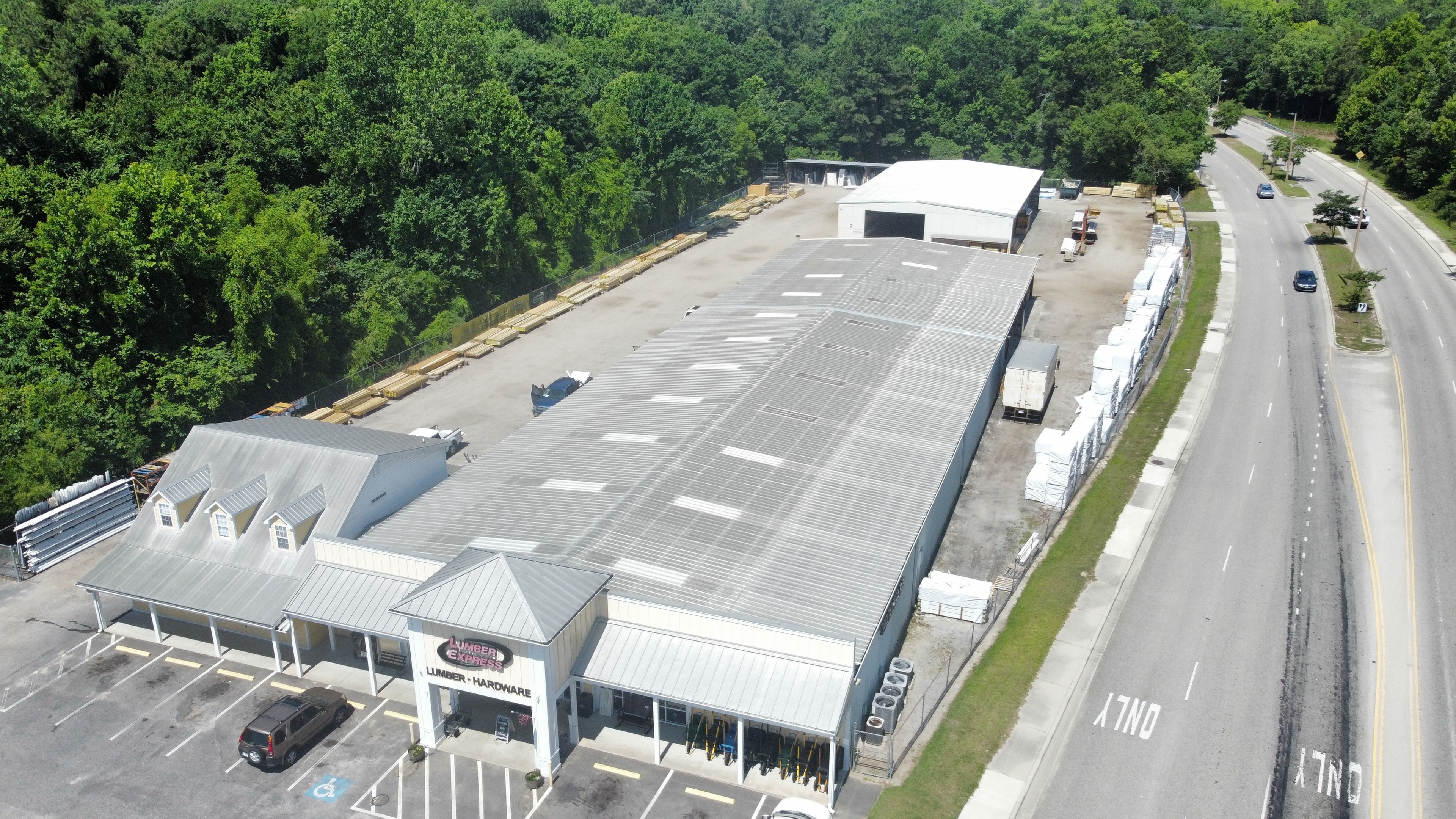 Lumber Express completed white roof coating — aerial view