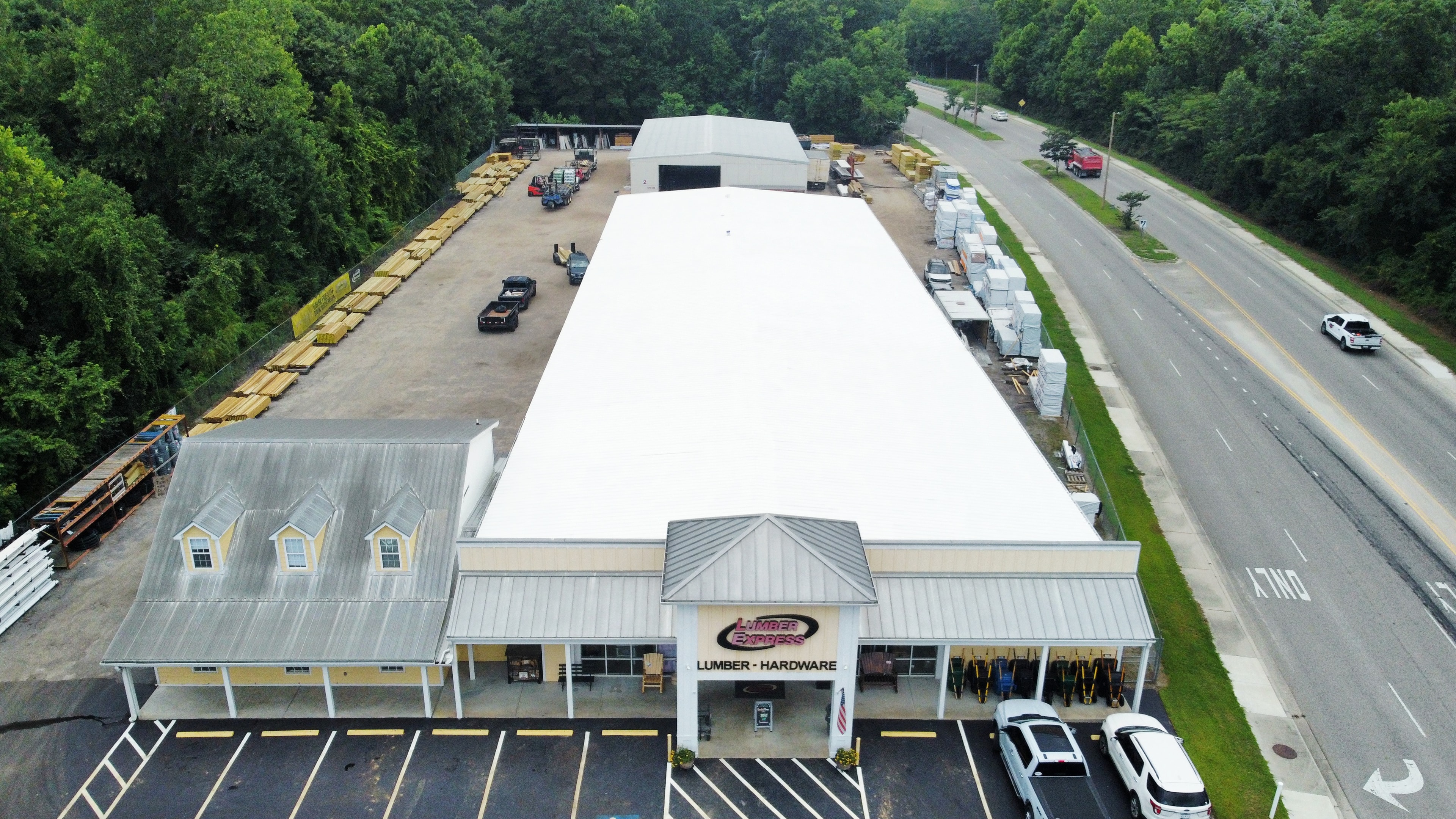 Lumber Express completed white roof coating — drone view
