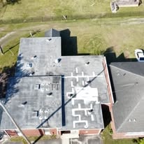 Ridgeville Police Station & Community Center roof before coating — aerial view of complex